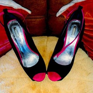 Black suede and fuchsia platform stilettos